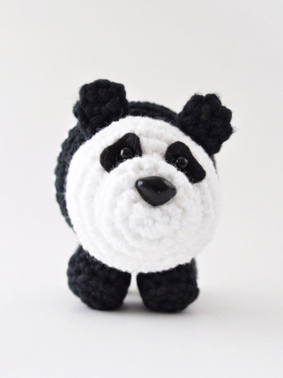 Crocheted panda bear amigurumi from pattern by The Pudgy Rabbit