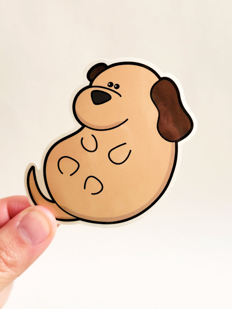 tan dog with dark brown ears sticker