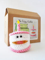 Pink and white birthday cake crochet kit