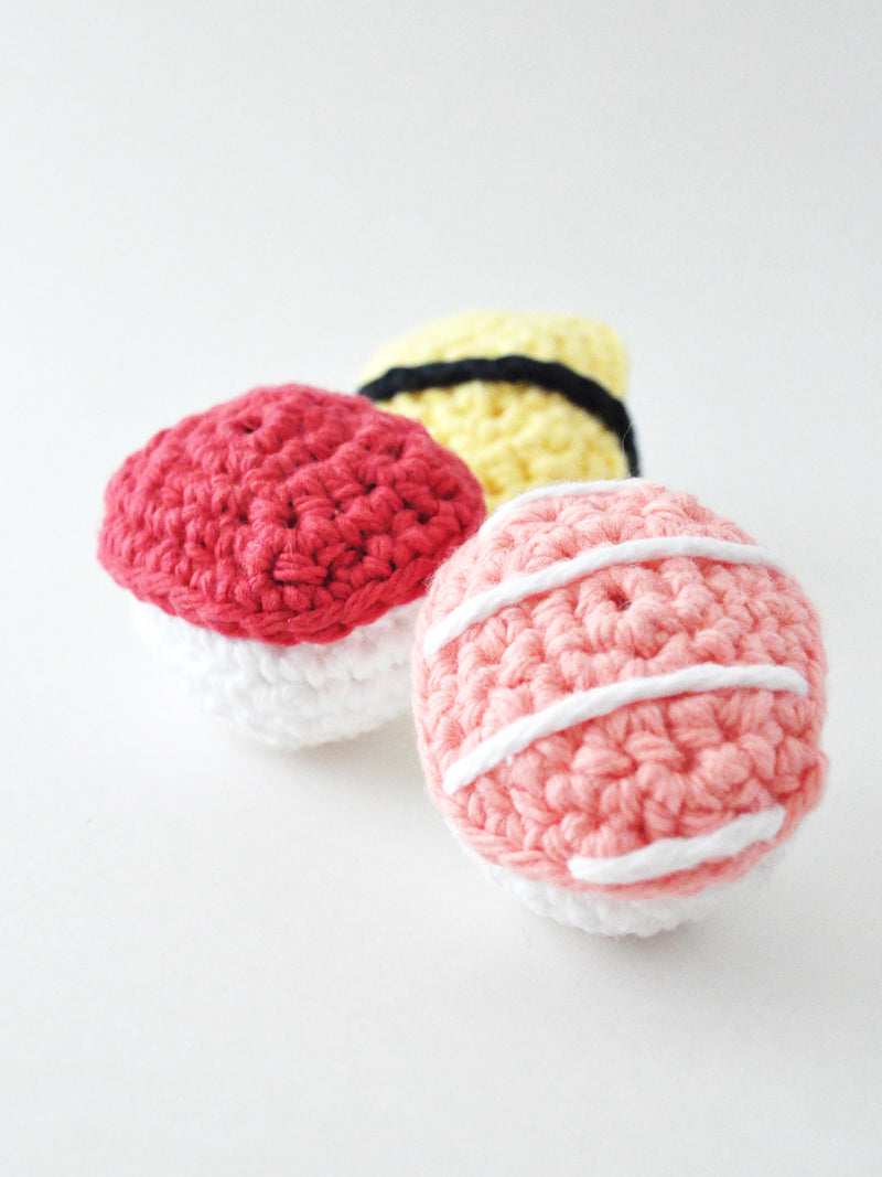Crochet three different pieces of sushi with this pattern